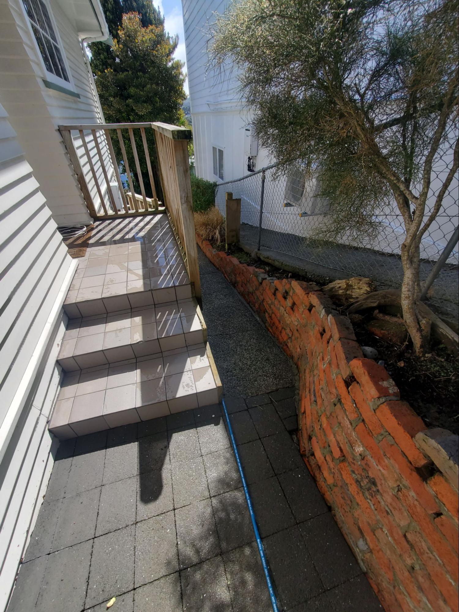 Brick retaining wall after water blasting