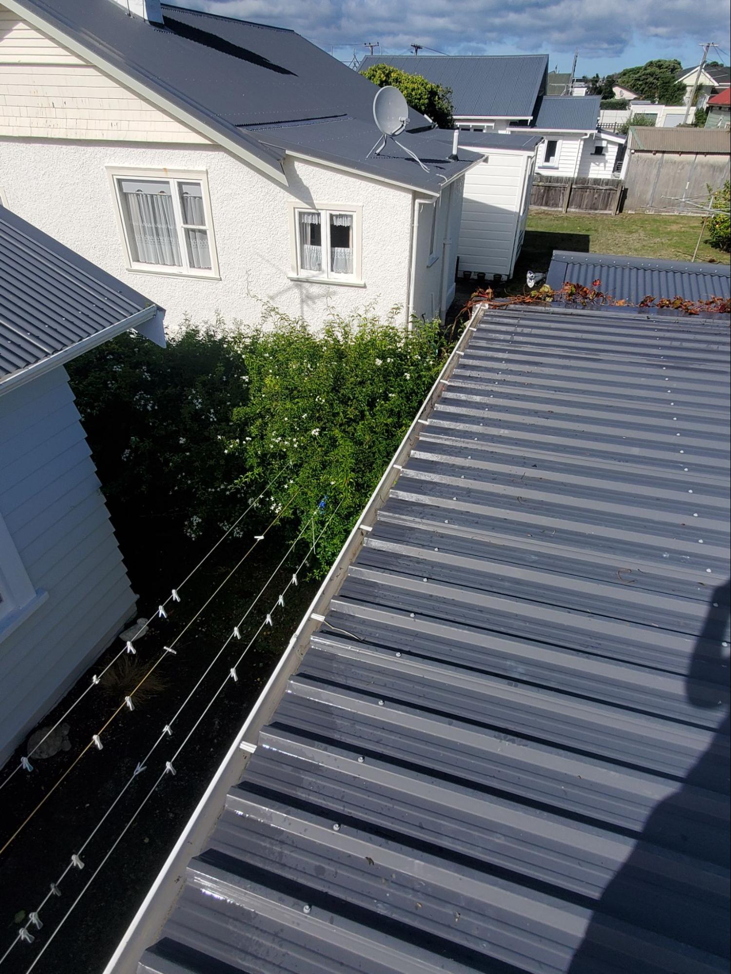 Roof gutter clean after water blasting